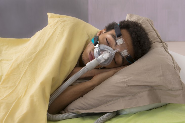 Sleeping with sleep apnea mask