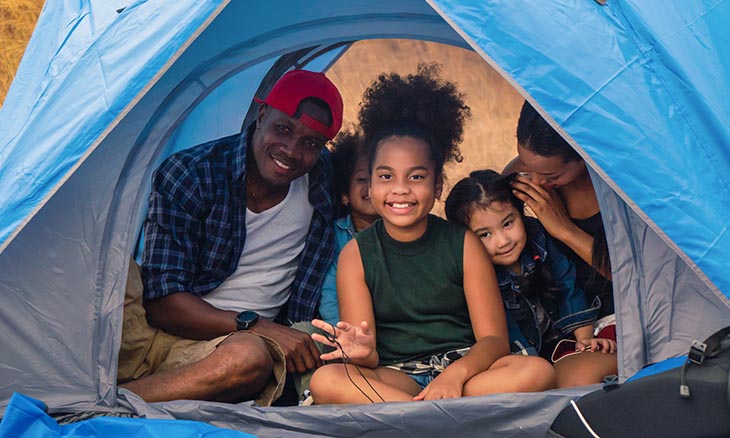 Family camping in the woods