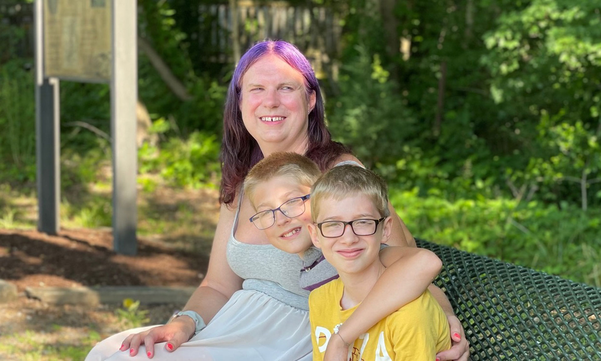 Danielle Washburn poses with her two sons