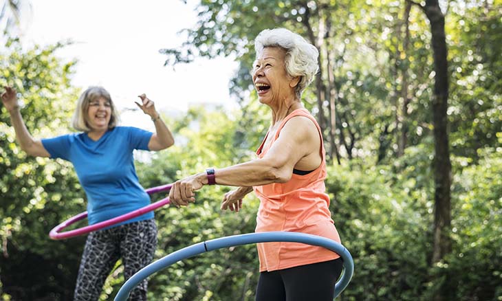 Women exercising with hula hoop after heart surgery