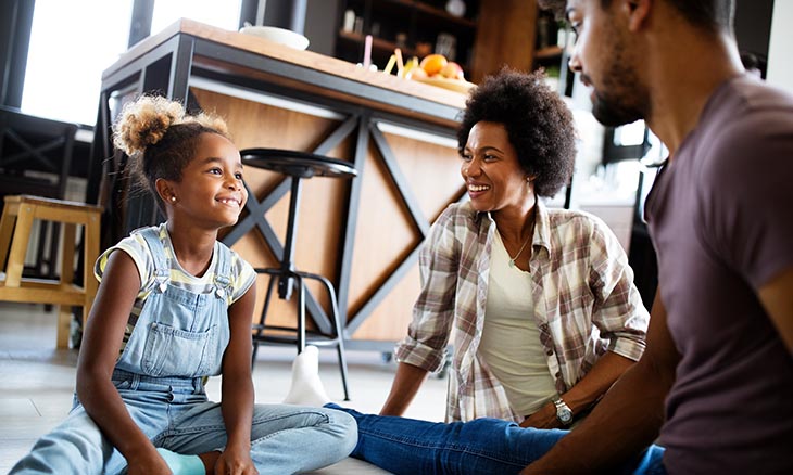 Parents have a discussion with child
