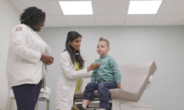 Pediatric patient at a visit with doctors