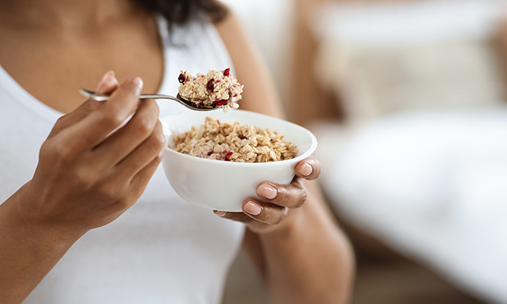 Women eating healthy breakfast