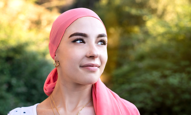 Cancer patient pink head scarf