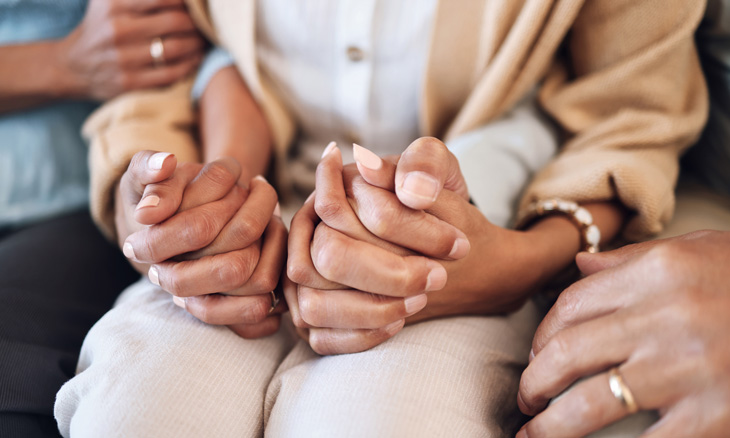 Woman holding hands