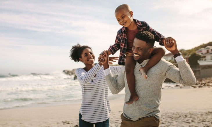 A family spends time at the beach.