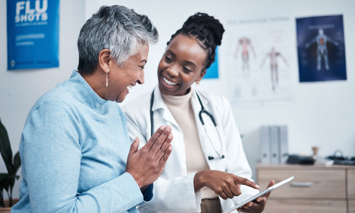 Woman prioritizing her health by talking to her primary care doctor