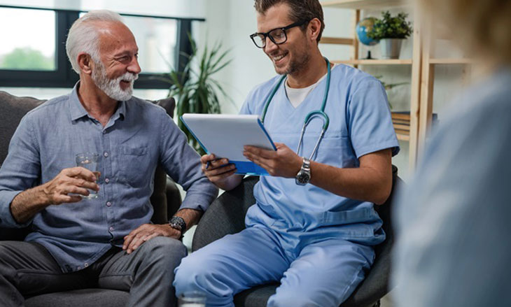 Doctor shows patient results on a tablet