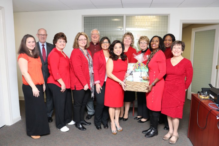 Group dressed in red for Go Red For Women