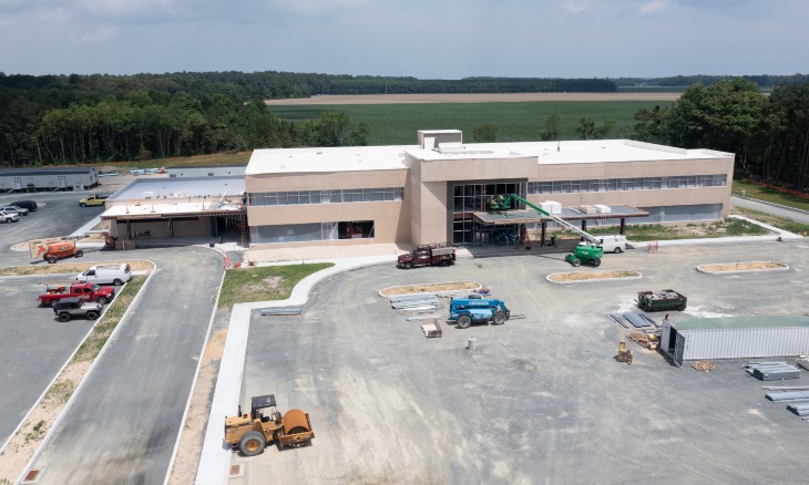 A drone shot of the construction site for the Route 9 Total Care Facility