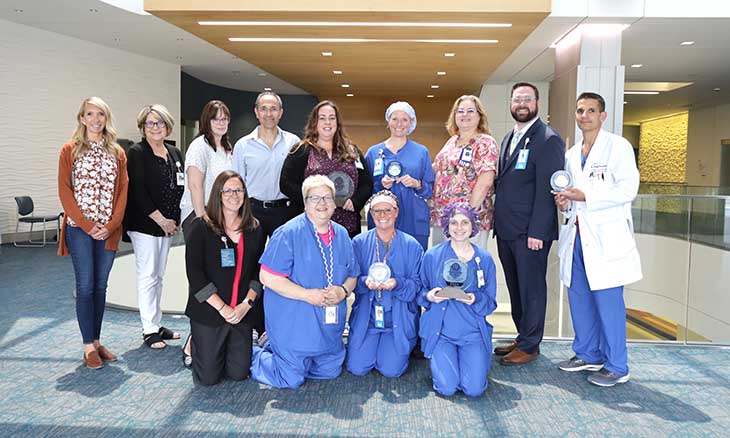 Heart and vascular team holds HeartCARE Center award