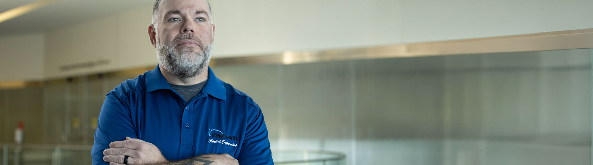 Clinical Engineering staff poses with arms crossed