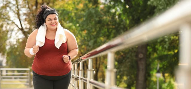 Women running in a park.