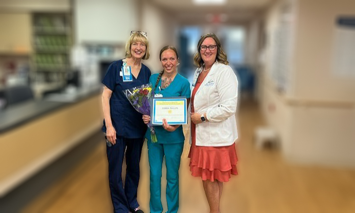 Kathleen Boyer, MSN, RN, CMSRN, CNML, Sierra Phillips, CNA, with her Sunshine Award and Rosemary (Rosi) Wurster, DNP, RN, MPH, NEA-BC, CEN. Kathleen Boyer, MSN, RN, CMSRN, CNML, Sierra Phillips, CNA, with her Sunshine Award and Rosemary (Rosi) Wurster, DNP, RN, MPH, NEA-BC, CEN.