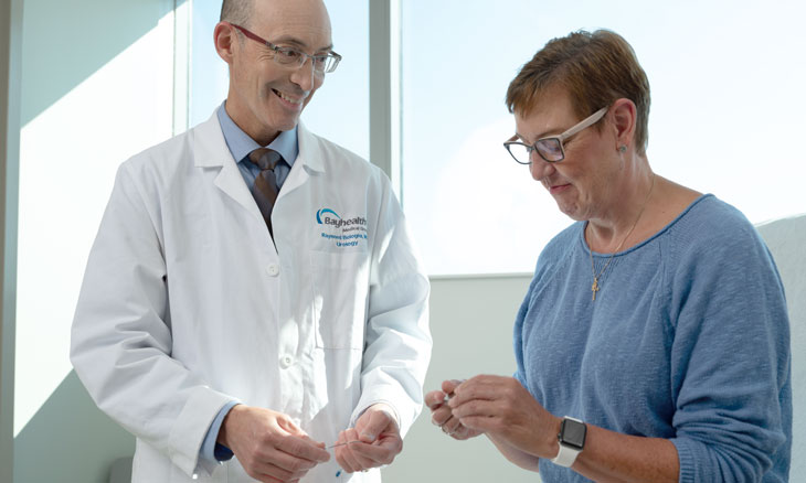 Physician with patient